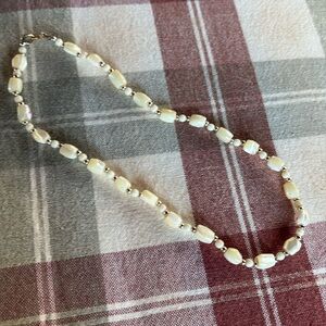 16 inch choker, pearly shells alternating little gold/ pearl beads